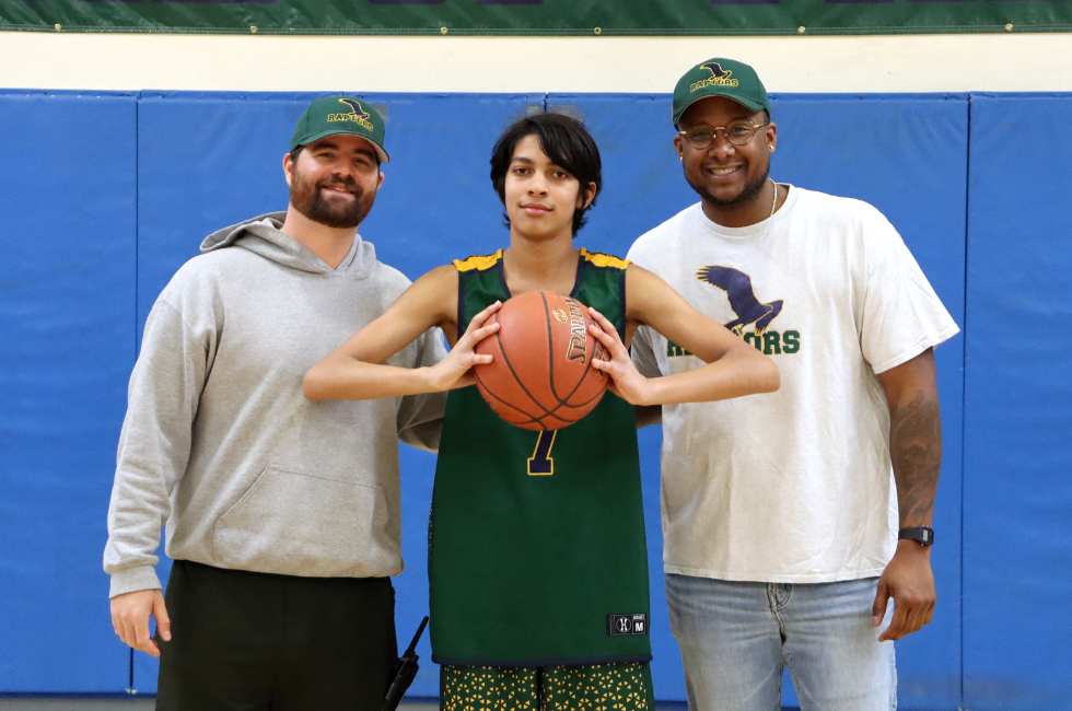 Student Yousef and his basketball coaches